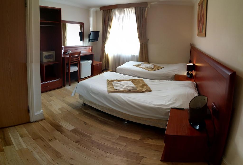 Corner House Hotel Londra Cameră foto